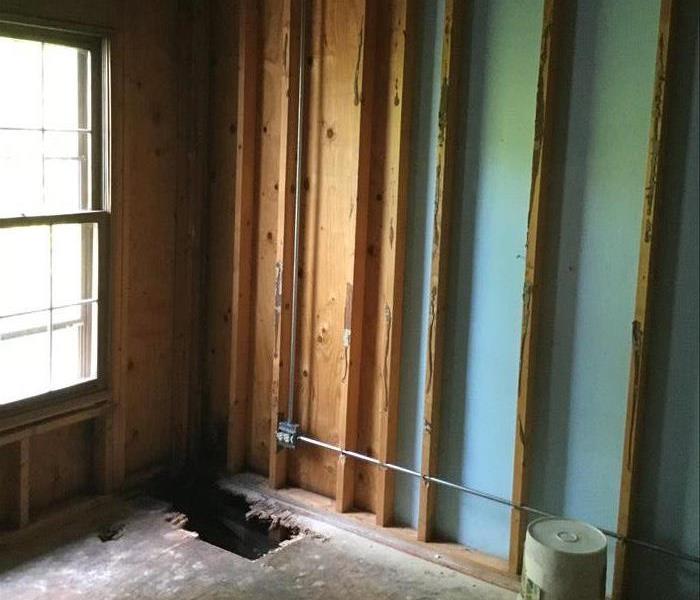 Same room after damaged drywall & insulation were removed